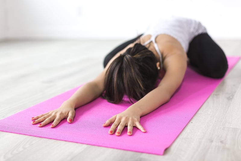 Woman practicing mindful breathing